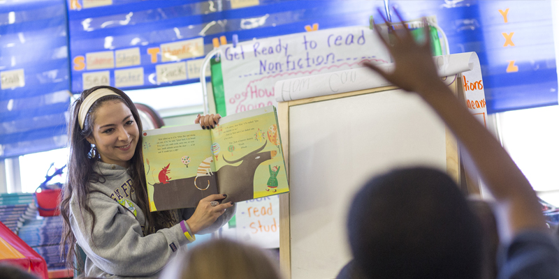 Teacher reading to students